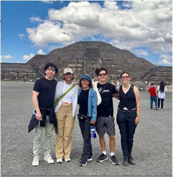 Carmela Unguez and family visiting a pyramid