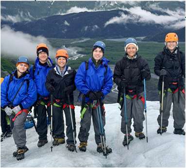 Carmela Unguez and family on a snowy mountain adventure