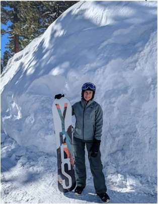 Deborah skiing in the mountains