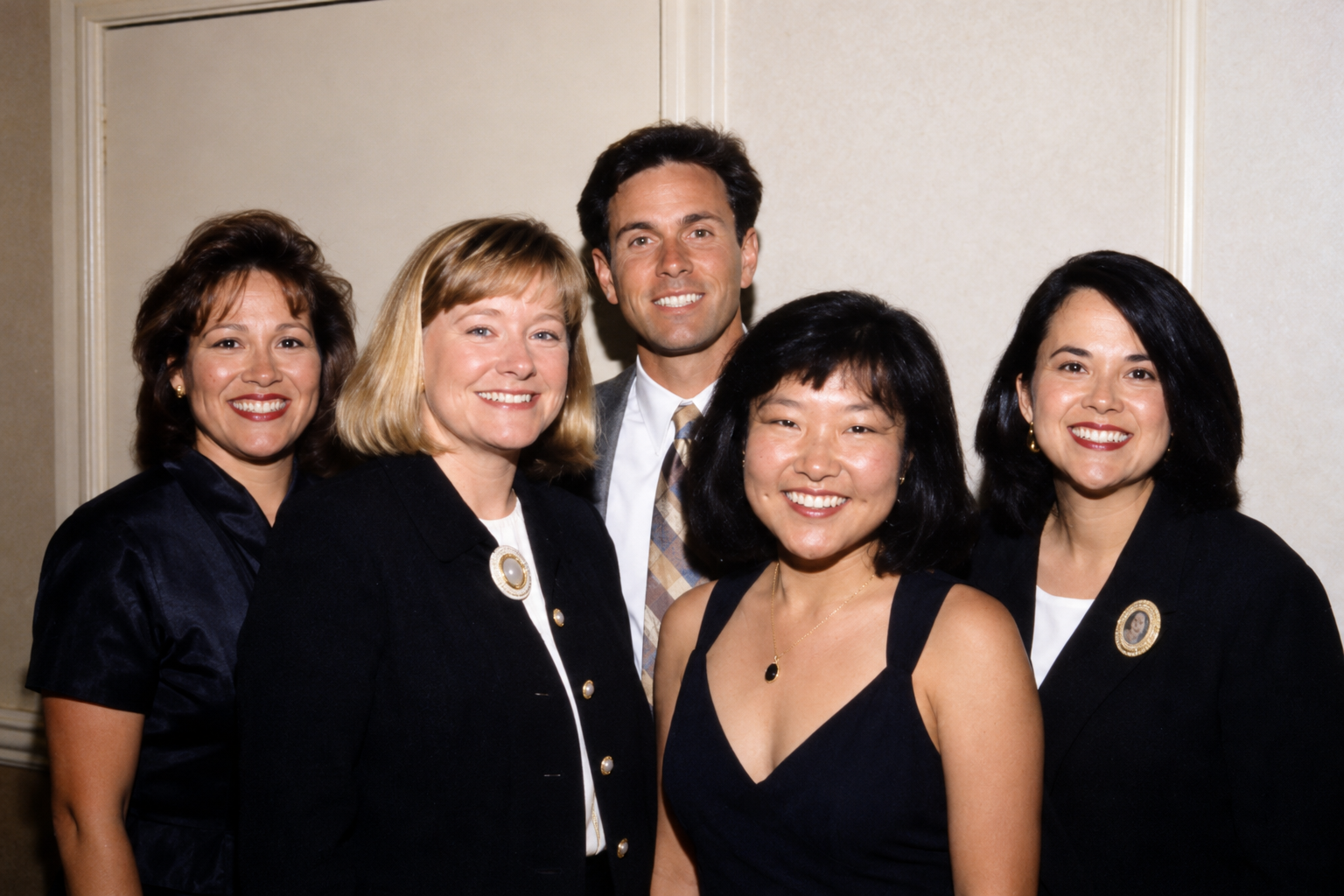 Five members of the Bullard Class of 1986 reunion committee pose together. Color interpretation.